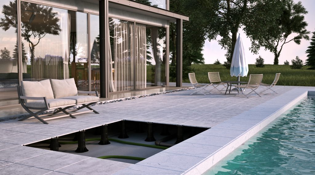 Terrasse avec dallage sur plots autour d'une piscine